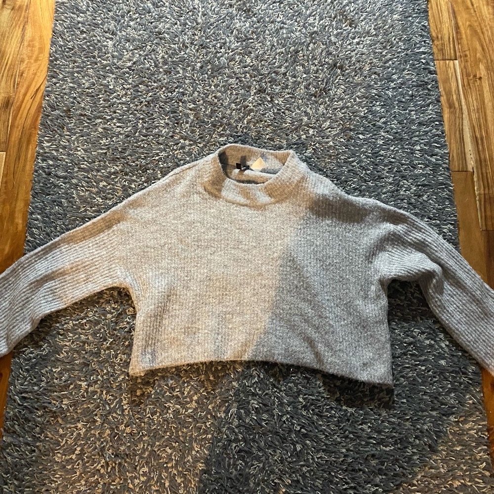 Gray cropped bell sleeve sweater